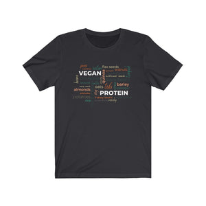 vegan protein word salad in fall colors on a dark grey vegan t shirt