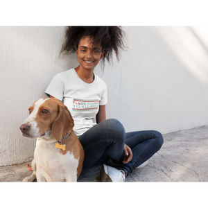 woman sitting with dog wearing "be kind to all kinds" boho style white vegan t shirt made for boho tops
