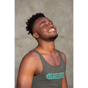 Charcoal black triblend vegan tank top with a lean green plant eating machine design in teal worn by a smiling man