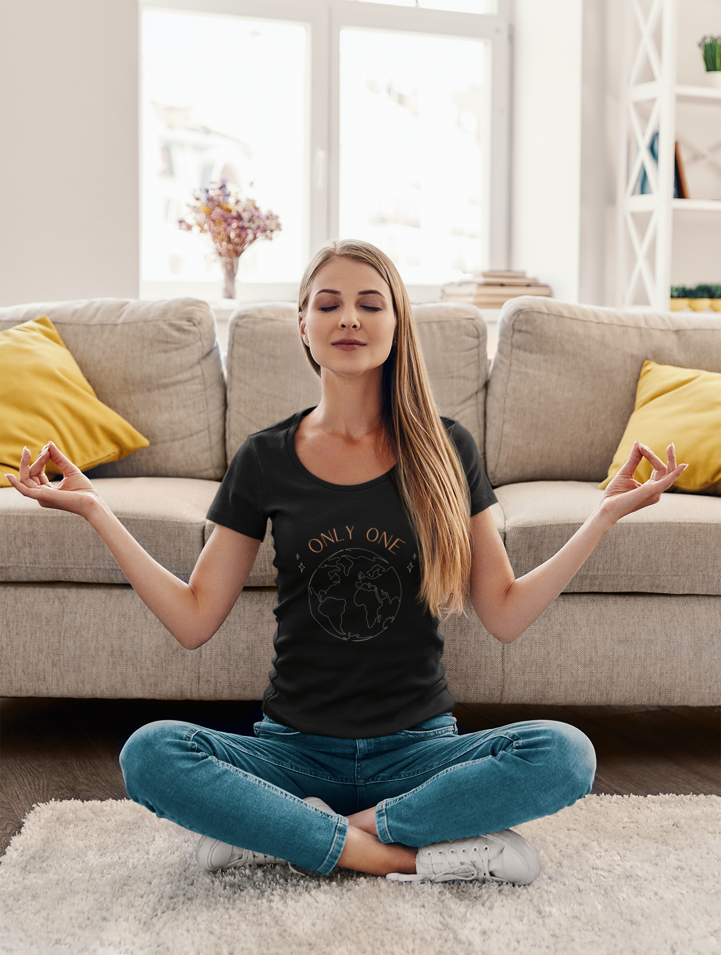 woman doing yoga wearing a ladies organic scoop neck vegan t-shirt saying only one earth