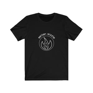 black colored vegan shirt with white graphic saying seitan sizzle over a circle with a flame design, laying flat on a plain white background, from vegan clothing brands