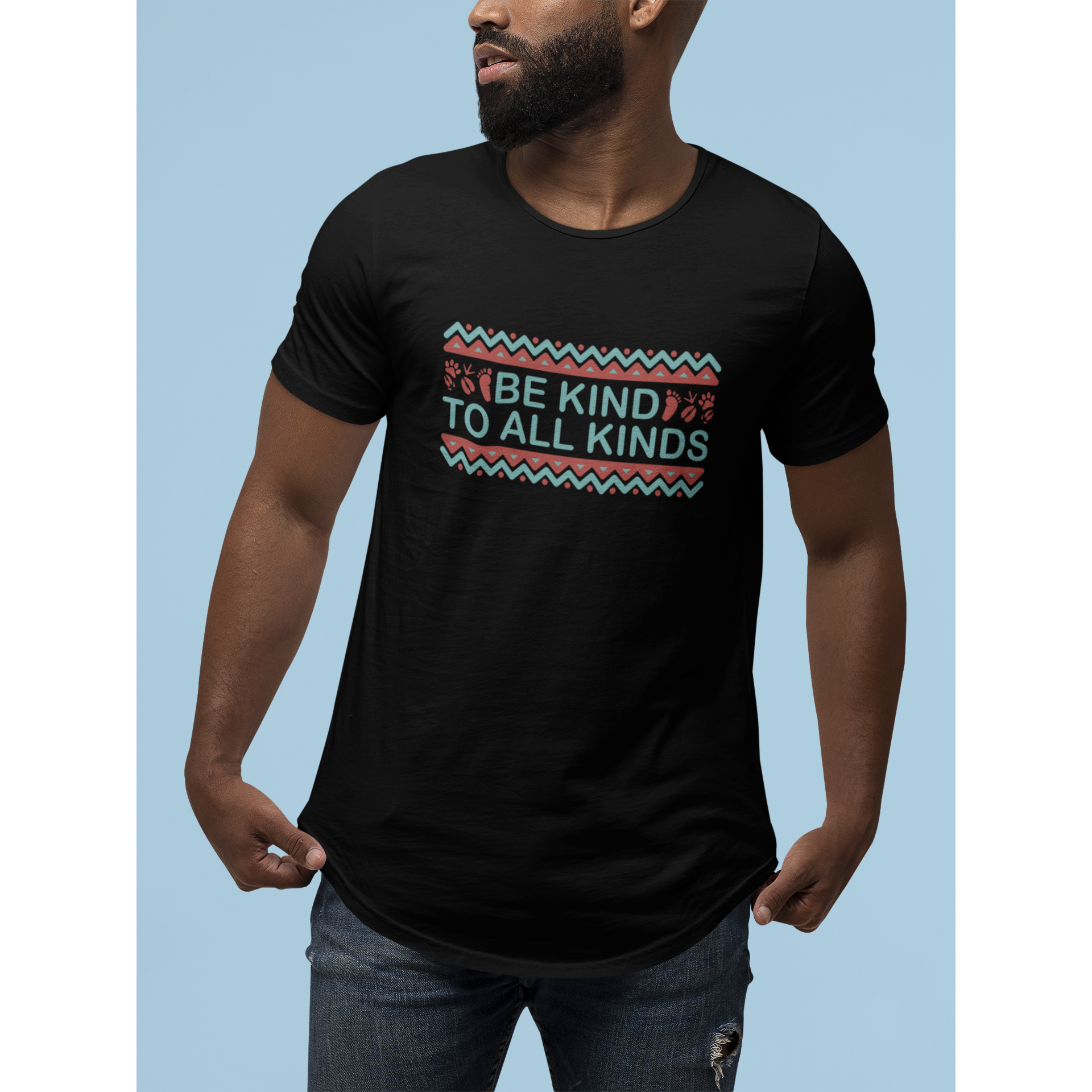 man wearing "be kind to all kinds" boho style black vegan t shirt made for boho tops