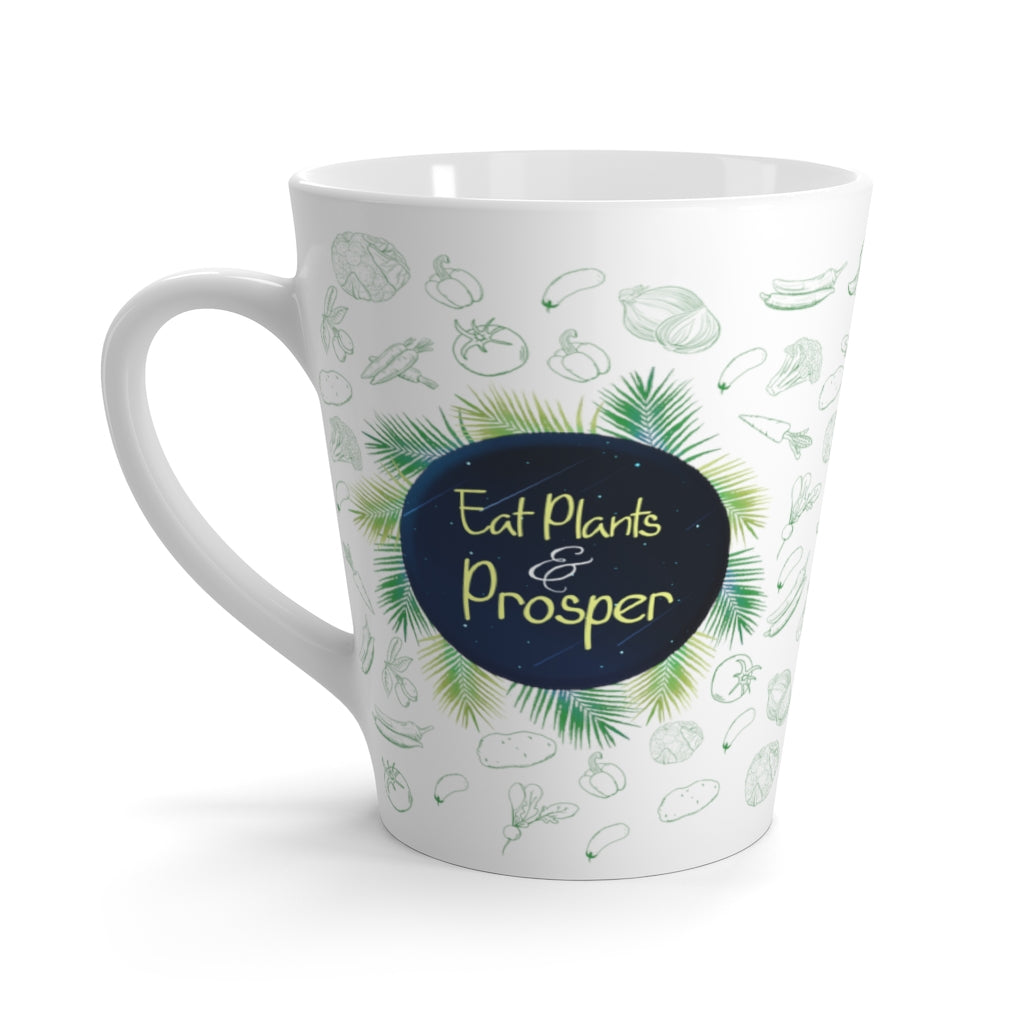 Latte mug saying eat plants and prosper with a green vegetable pattern, left side