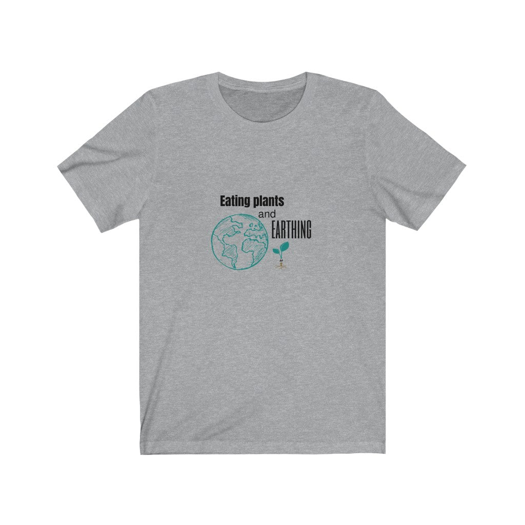 eating plants and earthing design on a athletic heather (light grey) vegan shirt with a white background, from ethical clothing brands and companies that donate to nonprofits, for those who eat plants and enjoy earthing