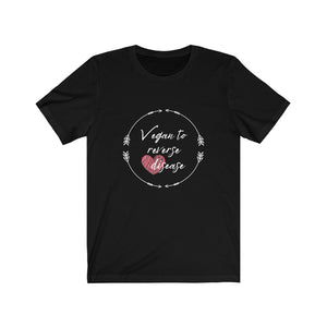 vegan shirt saying vegan to reverse heart disease on black premium cotton