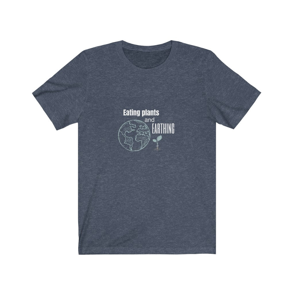 eating plants and earthing design on a heather navy colored vegan tshirt with a white background, from ethical clothing brands and companies that donate to nonprofits, for those who eat plants and enjoy earthing